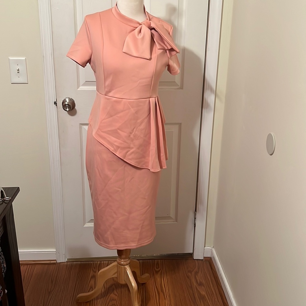 NWOT coral peplum body con pencil dress with bow